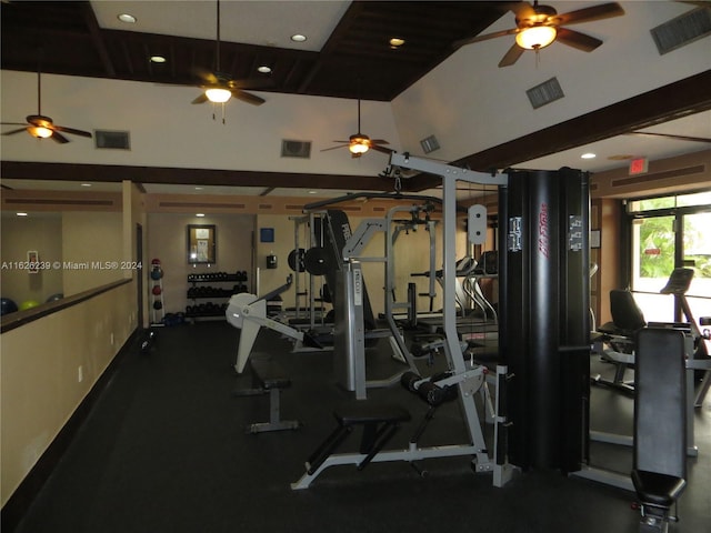 gym with lofted ceiling and visible vents