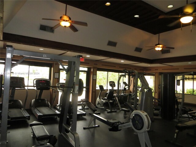 workout area featuring ceiling fan and visible vents