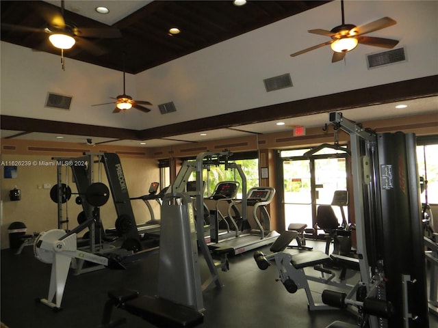 workout area with visible vents and ceiling fan