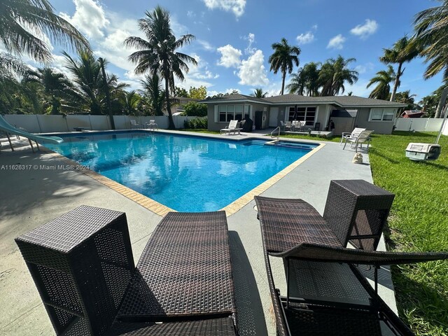 view of pool featuring a patio area