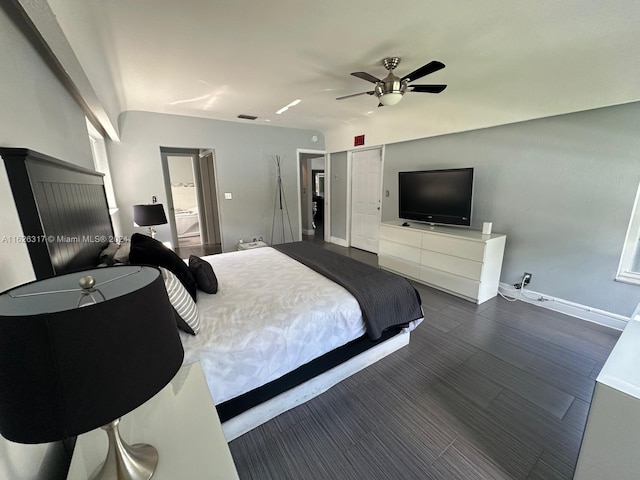 bedroom with ceiling fan and dark hardwood / wood-style floors