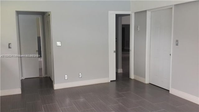 unfurnished bedroom featuring a closet