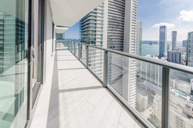 balcony featuring a water view