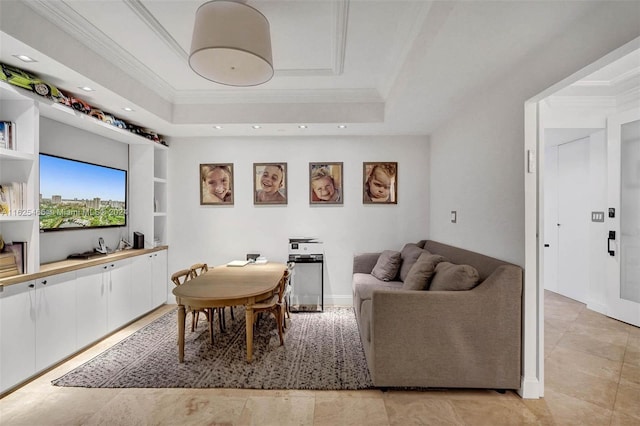 tiled living room with a tray ceiling