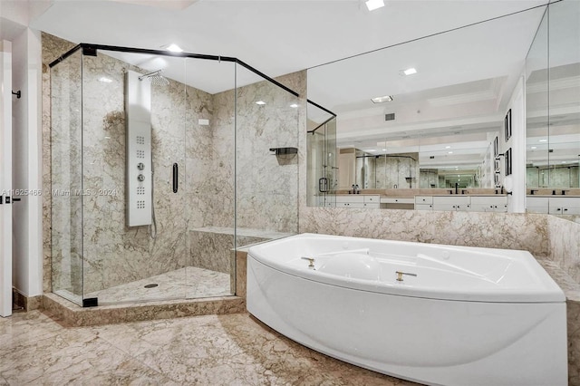 bathroom featuring tile patterned floors, plus walk in shower, sink, and ornamental molding