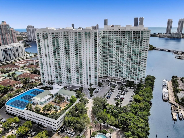 birds eye view of property featuring a water view