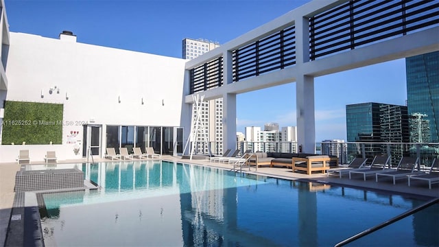 view of swimming pool featuring a patio