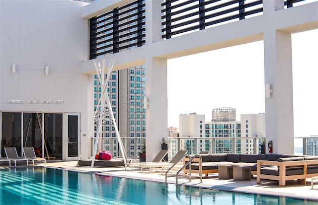 view of pool featuring an outdoor hangout area