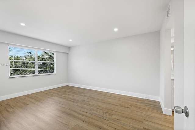 empty room with light wood-type flooring