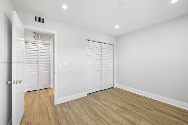 unfurnished bedroom featuring light hardwood / wood-style flooring