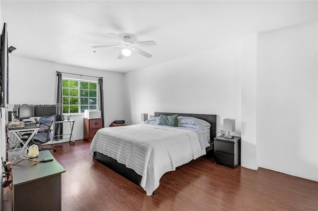 bedroom with ceiling fan and wood-type flooring