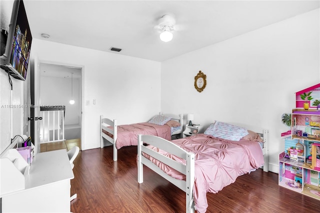 bedroom featuring wood-type flooring