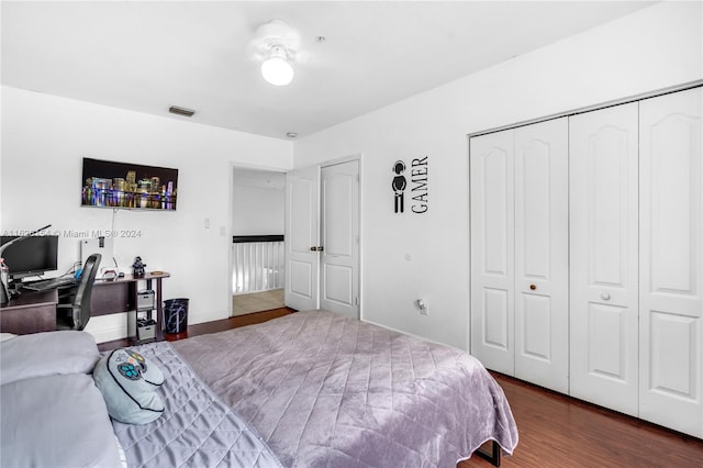 bedroom featuring a closet and hardwood / wood-style floors