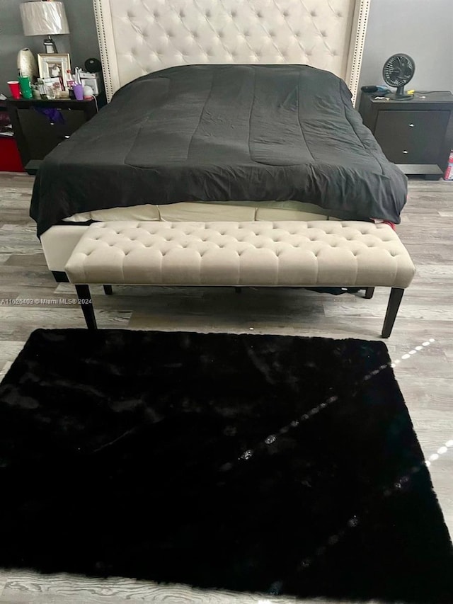 bedroom featuring hardwood / wood-style flooring