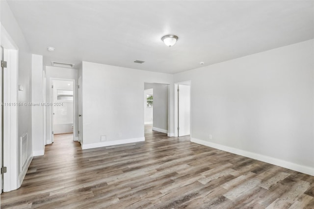 unfurnished bedroom featuring hardwood / wood-style floors