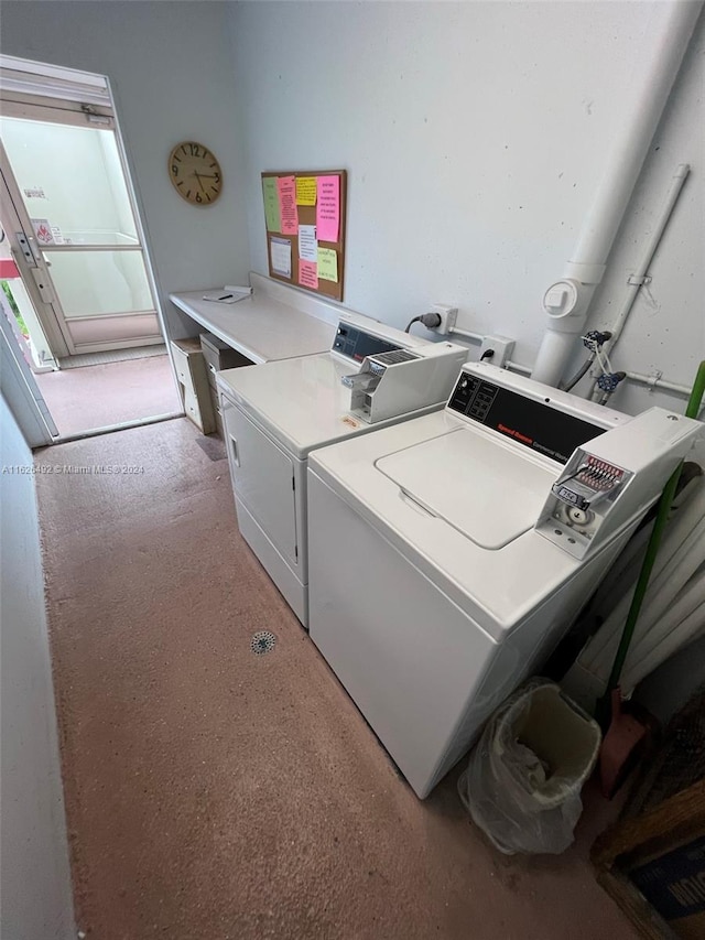 laundry room with washing machine and dryer