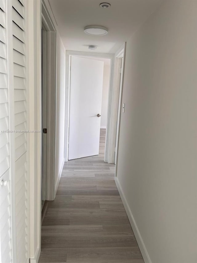 hallway featuring light hardwood / wood-style floors