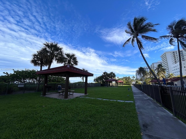 surrounding community featuring a gazebo, a yard, and a patio