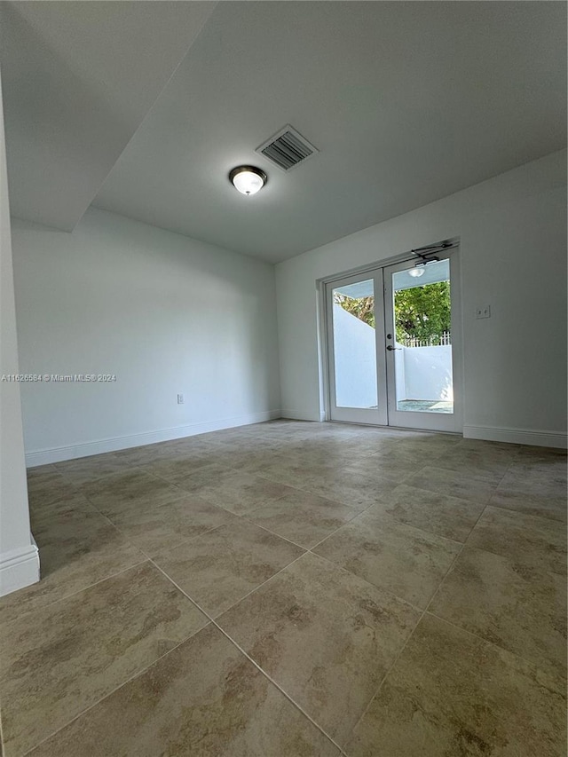 empty room with french doors