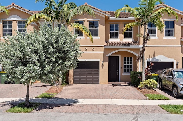 view of front of property with a garage