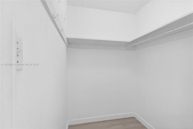 1200 W Ave Unit 515, Miami Beach, FL 33139 - spacious closet featuring light wood-style flooring