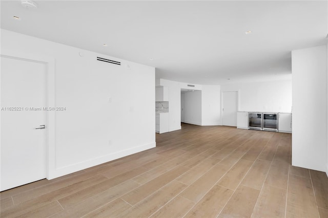 unfurnished living room featuring light hardwood / wood-style flooring