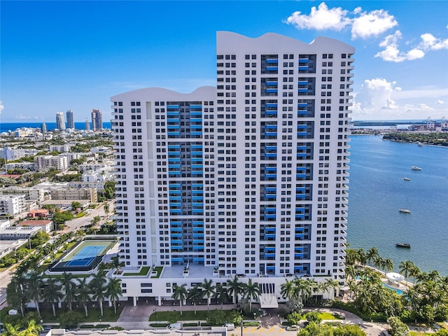 view of property with a water view