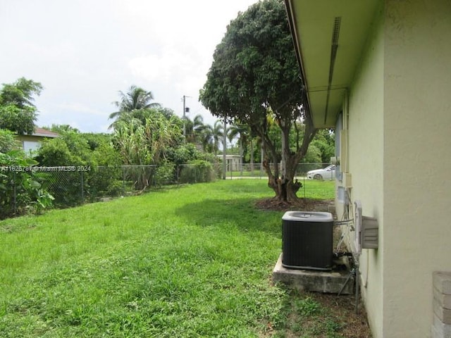 view of yard with central AC unit