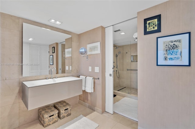 bathroom featuring an enclosed shower, vanity, and tile patterned floors