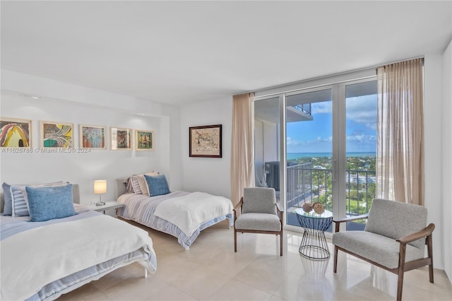 tiled bedroom featuring access to outside and expansive windows