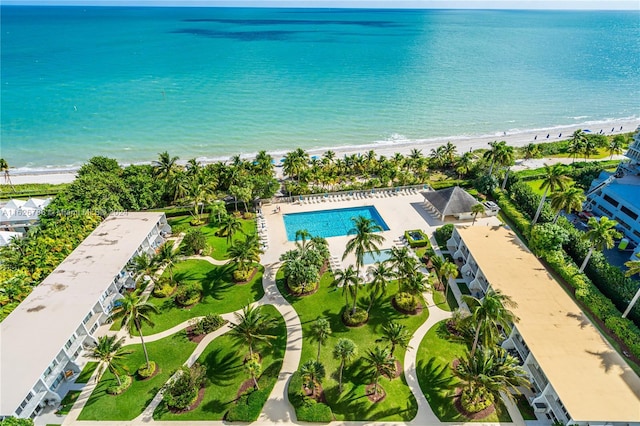 aerial view featuring a view of the beach and a water view