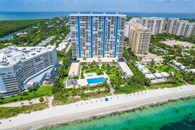 bird's eye view with a water view and a view of the beach