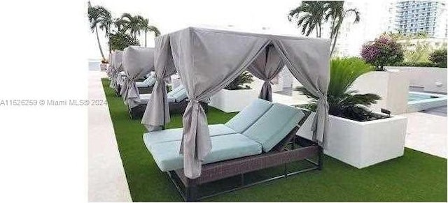 600 NE 27th St Unit 2302, Miami, FL 33137 - view of storm shelter with a yard