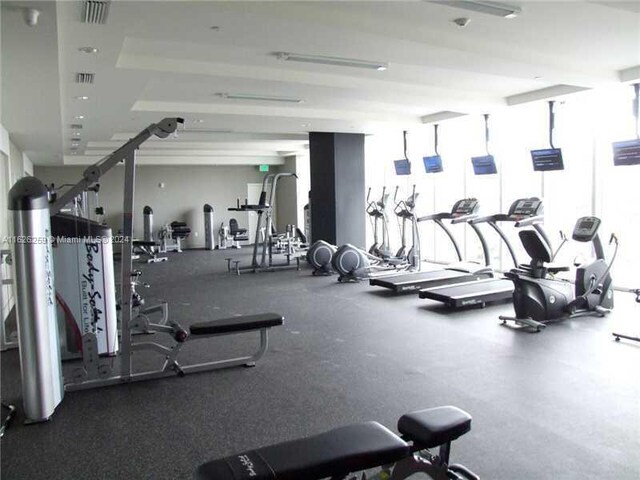 exercise room with plenty of natural light and expansive windows