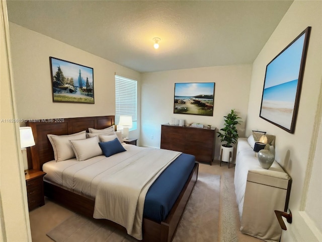 bedroom featuring light colored carpet