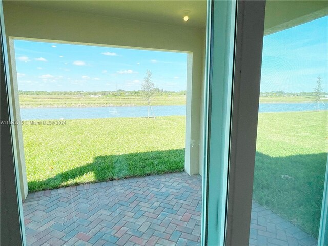 view of patio / terrace featuring a water view