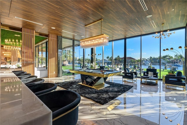 interior space featuring a water view and wooden ceiling