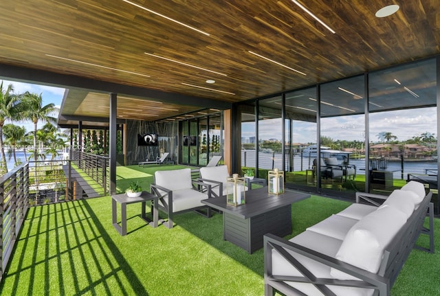 733 Middle River Dr, Fort Lauderdale, FL 33304 - surrounding community with an outdoor hangout area, a lawn, and a dock