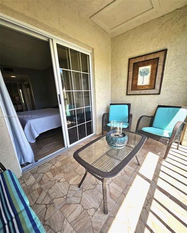 balcony featuring a patio area