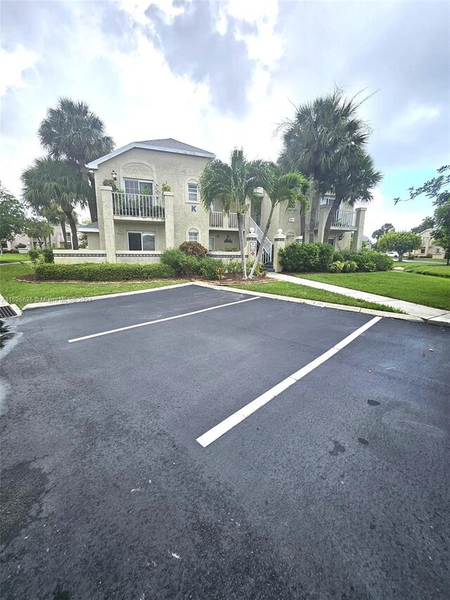 exterior space with a gazebo and a front lawn