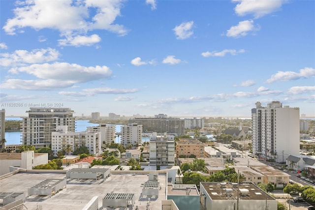 property's view of city featuring a water view