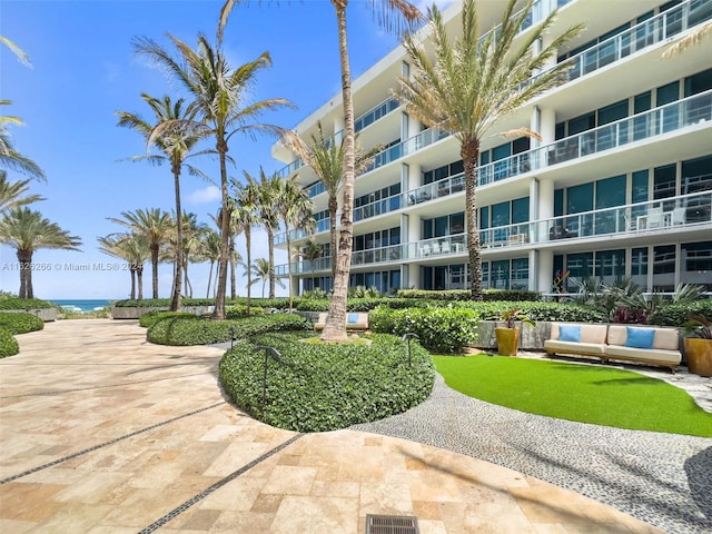 view of property's community with a patio area