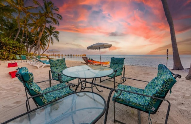 patio terrace at dusk with a water view