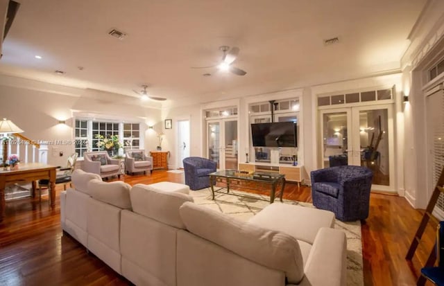 living room featuring french doors, ceiling fan, and hardwood / wood-style flooring