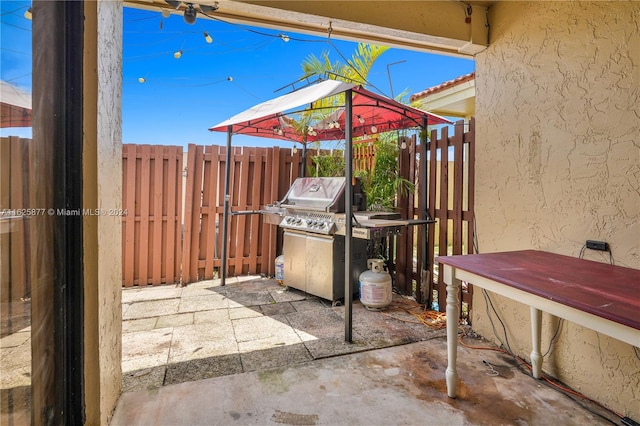 view of patio / terrace with a grill