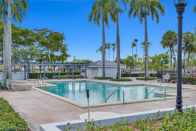 view of swimming pool with a patio area