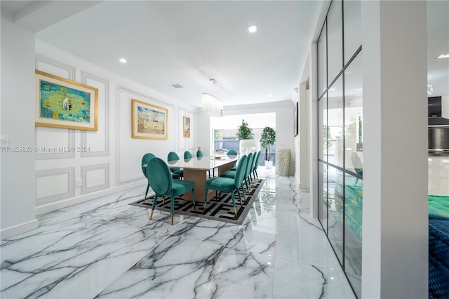 dining space featuring a healthy amount of sunlight and light tile patterned floors