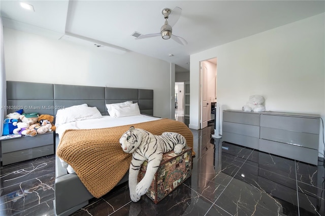 bedroom with tile patterned flooring and ceiling fan