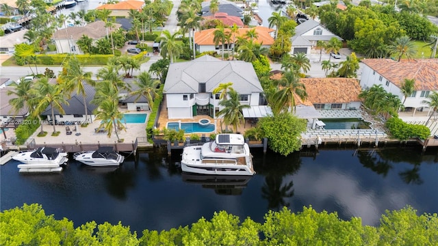 drone / aerial view with a water view