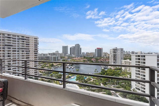 balcony featuring a water view